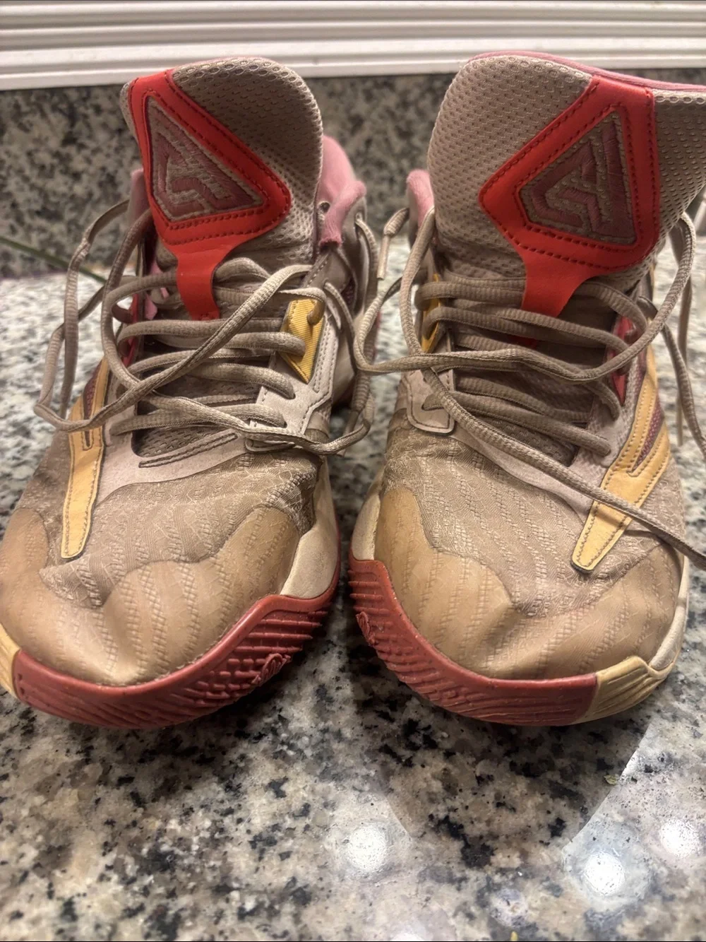 Nike Giannis Immortality 3 Neutral-Tone Athletic Sneakers with Pink Accents